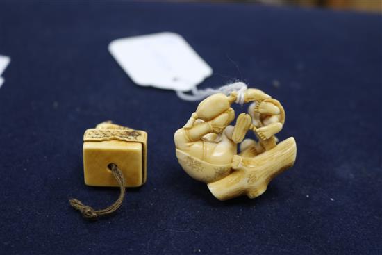 Four Japanese ivory netsuke, an okimono, an octopus and rats, a shi-shi maiju type netsuke, and two figure groups